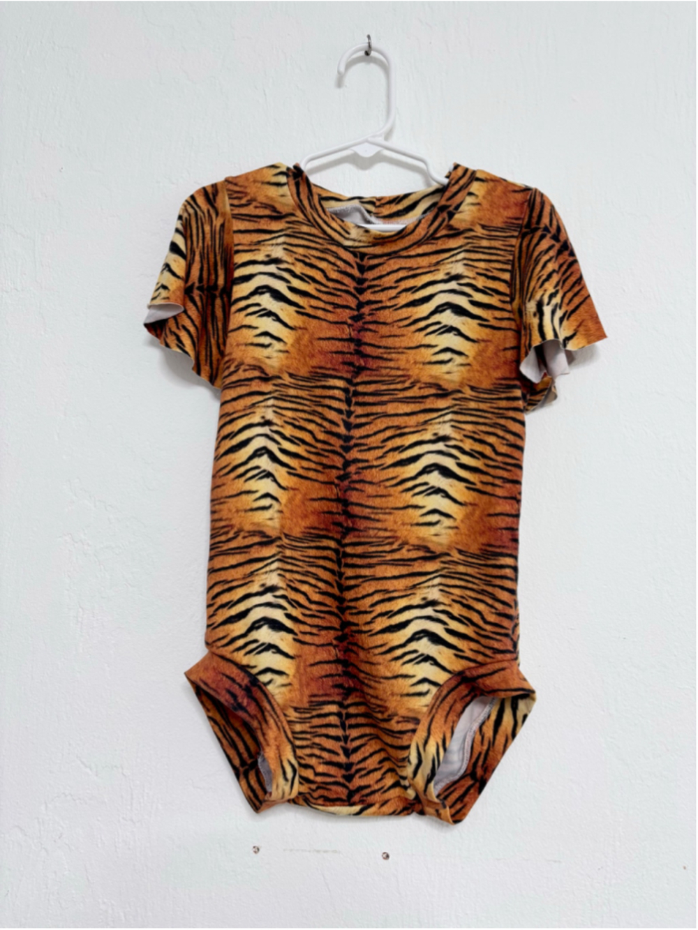 Girl’s Unbranded Tiger Print Romper size 6/7 Orange Black stretch